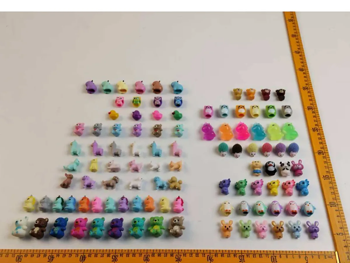Miniature fantasy figures including unicorns and dragons