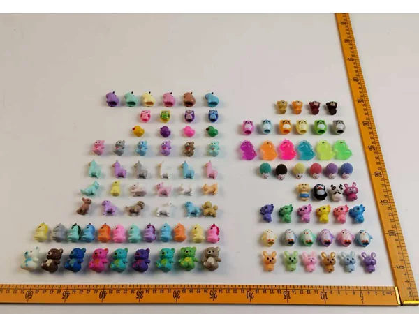 Miniature fantasy figures including unicorns and dragons